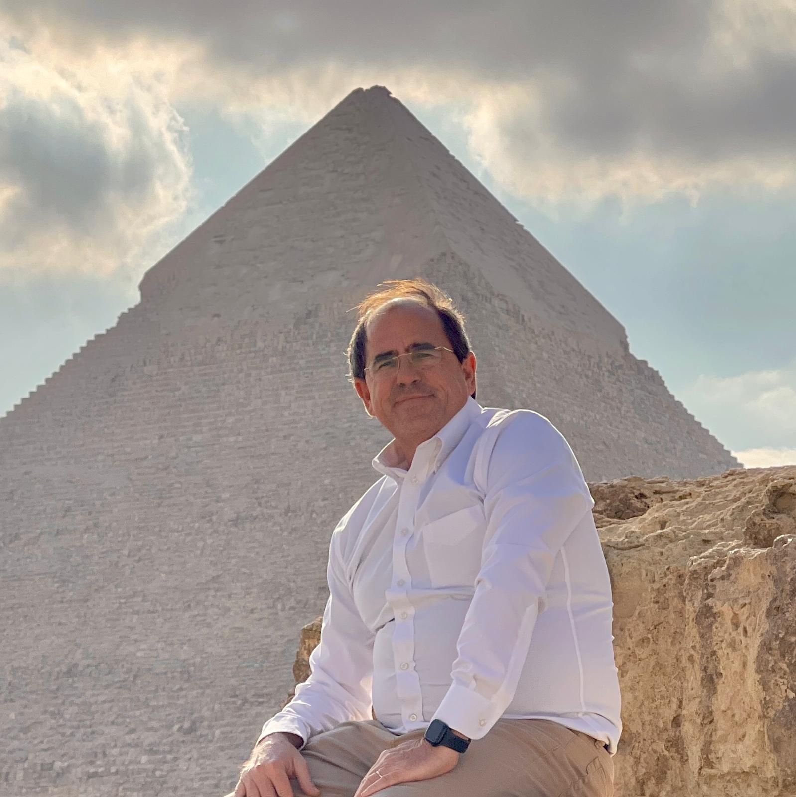 John Waller in front of a pyramid in Egypt